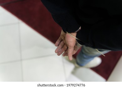 Man Tied With A Plastic Zip Tie Handcuffs