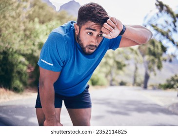 Man, tired and sweating for sports training, exercise break and workout challenge in nature park. Indian athlete, runner and breathe for fitness rest, outdoor running and fatigue of cardio marathon - Powered by Shutterstock