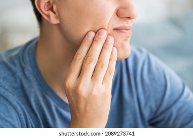A man with toothache, periodontal disease in wisdom teeth, health problems concept - Shutterstock ID 2089273741