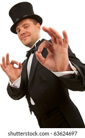 Man with top hat making 'ok' gesture