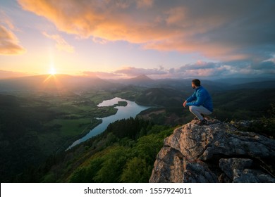 Man At The Top Of A Mountain 