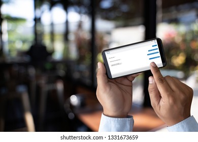 man touch on button instant messaging app on mobile phone