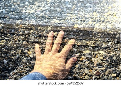 Man touching beach