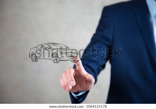 man touching\
car in screen on dark\
background