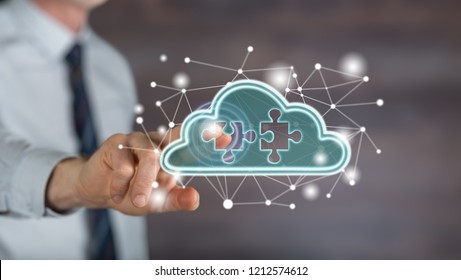 Man touching a cloud networking concept on a touch screen with his finger
