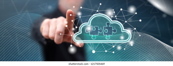 Man touching a cloud networking concept on a touch screen with his finger