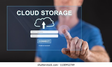 Man touching a cloud storage concept on a touch screen with his finger