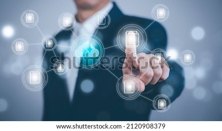 Man touching connect to data information on the Cloud Computing Technology Internet Storage Network Concept And a large database big data Through internet technology, Cloud sharing download and upload