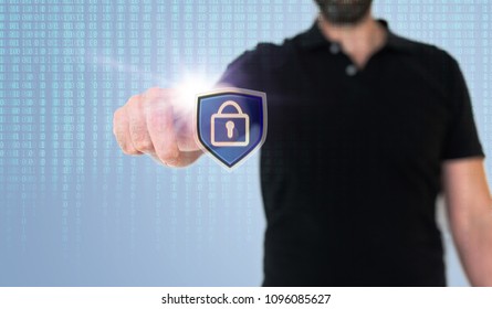 man touching data security or data privacy icon on translucent screen with binary code in background, digital composite
