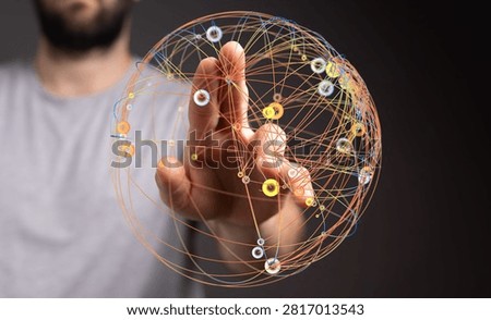 Man touching a digital sphere, global network concept.