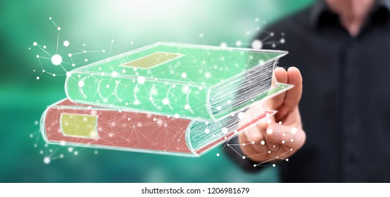 Man touching an e-learning concept on a touch screen with his fingers