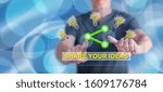 Man touching an ideas sharing concept on a touch screen with his fingers
