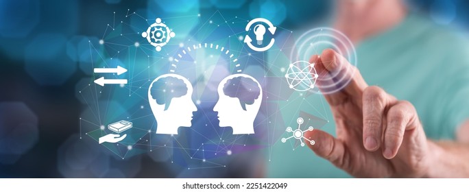 Man touching a knowledge sharing concept on a touch screen with his finger