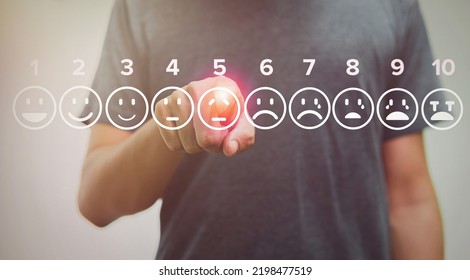 man touching sad of pain scale icons virtual screen interface, medical technology and futuristic concept. - Powered by Shutterstock - Get 15% off with code: PIKWIZARD15