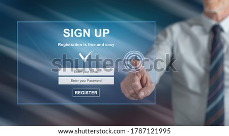 Man touching a signup concept on a touch screen with his finger