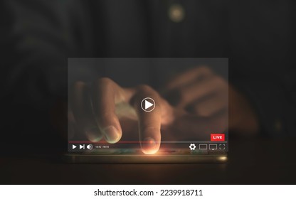 Man touching smartphone to watching and live streaming window for Video streaming on internet and multimedia technology concept.