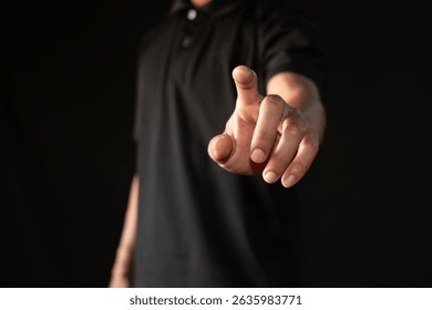 A man is touching a virtual interface with his finger.