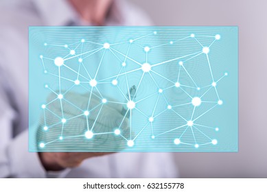 Man touching a virtual network concept on a touch screen with a pen