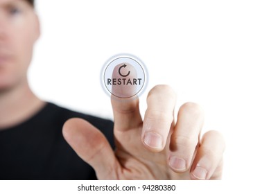 Man Touching A Virtual Restart Button