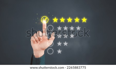 Man touching the virtual screen on five star icon to give satisfaction in service. Rating very impressed. Assessment customer service, testimonial and satisfaction concept.