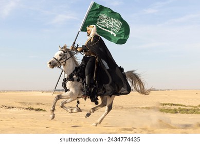 Man in traditional clothing with his horse in a desert