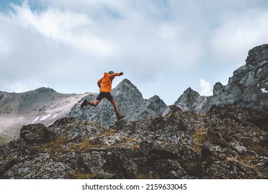 Man trail running in rocky mountains travel hiking adventure activity outdoor summer vacations healthy lifestyle skyrunning extreme sport concept - Powered by Shutterstock