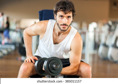 Man Training In A Gym