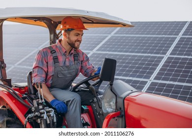 Man Truck Driving By Solar Panels