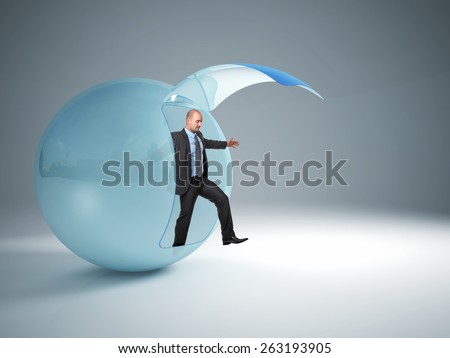 man try to exit from his glass sphere