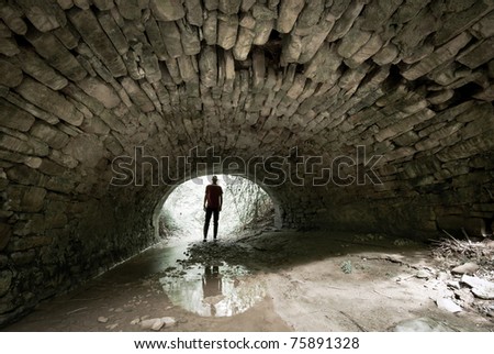 man in a tunnel