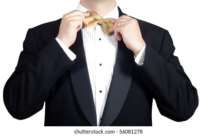 Man In Tuxedo Adjusting Bow Tie. Closeup.