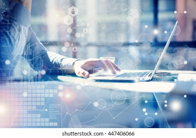 Man Typing Keyboard Laptop Hand.Project Manager Researching Process.Business Team Working Startup modern Office.Global Strategy Virtual Icon.Innovation Graphs Interfaces.Analyze market stock.Blurred - Shutterstock ID 447406066