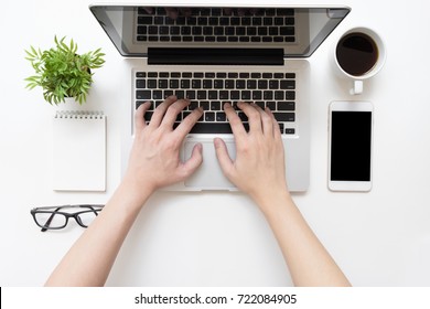 Man Is Typing On Laptop Keyboard, Top View.