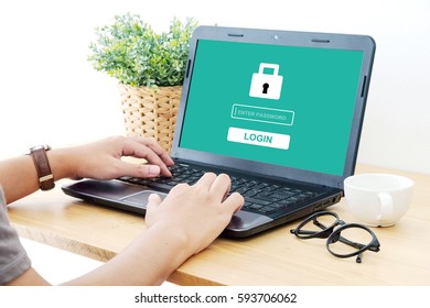 Man typing password on labtop screen background, cyber security concept - Shutterstock ID 593706062