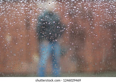 man under the rain