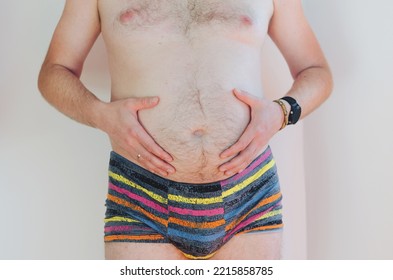 Man In Underwear With Fat Belly, Overweight Male Body Isolated On White Background. Lose Weight. Concept Of Surgery, Subcutaneous Fat Breakdown. Body Positive