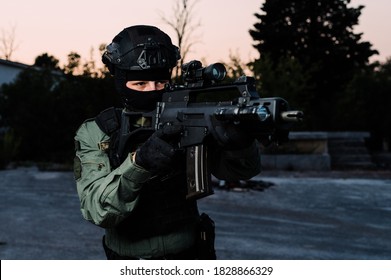 Man In Uniform Of Special Military Police Unit From Croatian Army. He Is Equipped With Tactical Gear And Assault Rifle.