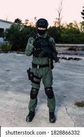 Man In Uniform Of Special Military Police Unit From Croatian Army. He Is Equipped With Tactical Gear And Assault Rifle.