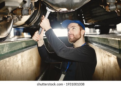 Man In Uniform. Truck Repair. Car Malfunction