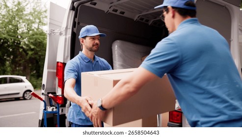 Man Unloading Boxes From Van For Removal And Delivery Service, Teamwork.