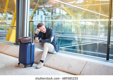 Man upset at the airport his flight is delayed