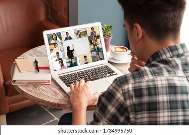 Man Use Computer Laptop With Screen Of Video Conference Of Course Online Attended By People From Many Places