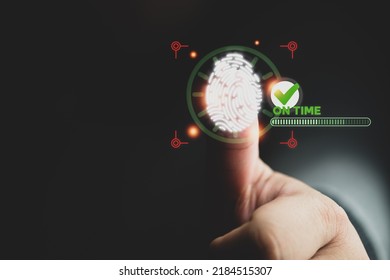 Man use a fingerprint for scan on visualizer screen to check in with on time  used to track and monitor when employees start work. The concept of human resource management