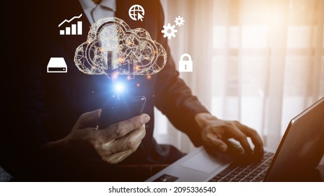 man use Laptop with cloud computing diagram show on hand. Cloud technology. Data storage. Networking and internet service concept.