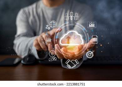 man use Laptop with cloud computing diagram show on hand. Cloud technology. Data storage. Networking and internet service concept.
