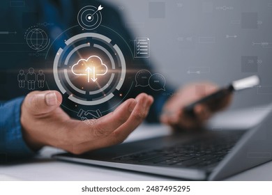 man use Laptop with cloud computing diagram show on hand. Cloud technology. Data storage. Networking and internet service concept.