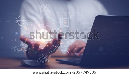 man use Laptop with cloud computing diagram show on hand. Cloud technology. Data storage. Networking and internet service concept.