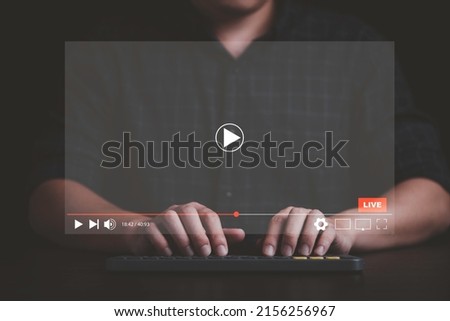 Man use laptop computer to watching and live streaming window for Video streaming on internet and multimedia technology concept.