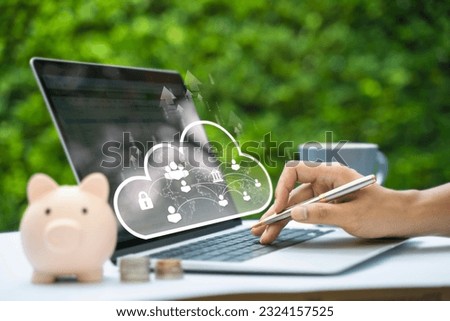 Man use smartphone and Laptop with cloud computing diagram. Cloud technology. Data storage. Networking and internet service concept. Money saving concept. nature background.