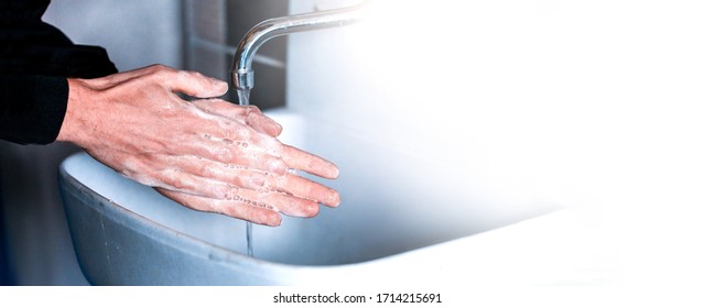 Man Use Soap And Washing Hands Under Wather Tap After Work. Pandemic Concept.